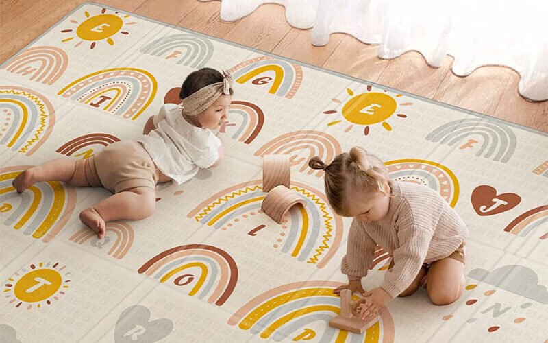 Foldable waterproof reversible play mat for crawling kids