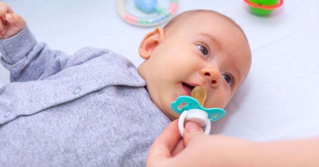 Baby Pushes Pacifier Out With Tongue